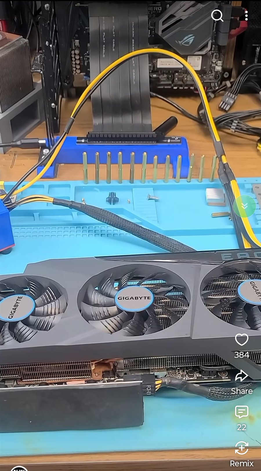 Green AutoScroller bubble active on YouTube Shorts over computer repair content
